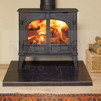SVX1335 Stovax Stockton 11 Woodburning Eco Stove, Double Door <!DOCTYPE html>
<html lang=\"en\">
<head>
<meta charset=\"UTF-8\">
<meta name=\"viewport\" content=\"width=device-width, initial-scale=1.0\">
<title>Stovax Stockton 11 Woodburning Eco Stove, Double Door</title>
</head>
<body>
<h1>Stovax Stockton 11 Woodburning Eco Stove, Double Door</h1>

<ul>
<li>EcoDesign Ready, ensuring lower emissions and improved energy efficiency</li>
<li>Large double doors offer a splendid view of the flames and simplify loading</li>
<li>Integrated Airwash system keeps the glass clean, enhancing visibility and enjoyment</li>
<li>High-performance, clean-burning with a nominal heat output of 11kW</li>
<li>Cast iron construction for durability and sustained heat output</li>
<li>Multi-fuel capability allows for the burning of seasoned wood and smokeless fuels</li>
<li>Flat top design provides a classic stove appearance that suits a variety of interiors</li>
<li>Optional wood burning tray available for improved wood burning efficiency</li>
<li>Available in a variety of colours to match your home decor</li>
<li>Approved for use in Smoke Control Areas, making it ideal for urban settings</li>
<li>5-year extended warranty for peace of mind</li>
</ul>
</body>
</html> Stovax Stockton 11, woodburning stove, eco stove, double door, Stockton 11 Eco